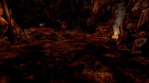 A fire-pit that makes a common meeting place for grotto inhabitants.